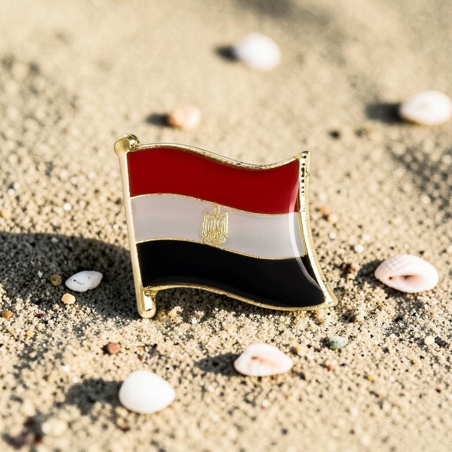 Pins & Co. Egypt national flag lapel pin with a waving design, gold-tone metal border, and enamel finish.
