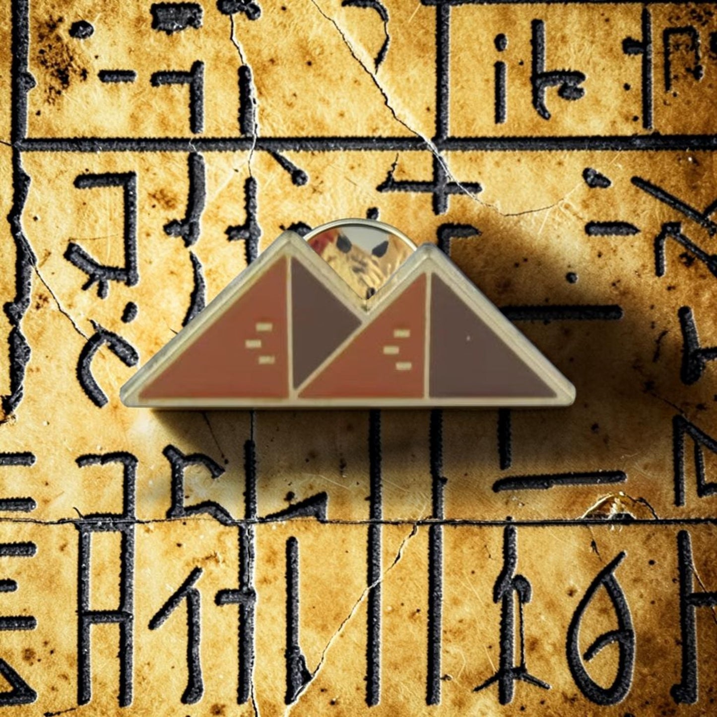 Pins & Co. Giza Pyramids enamel pin in terracotta and brown with a polished gold-tone metal finish.